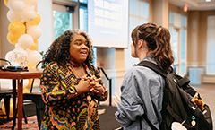 student and presenter talking